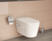 Безободковый подвесной унитаз VitrA Nest  (c функцией биде, встроенным смесителем, с бачком  VitrA Fresh для моющего средства),  дюропластовое сиденье микролифт